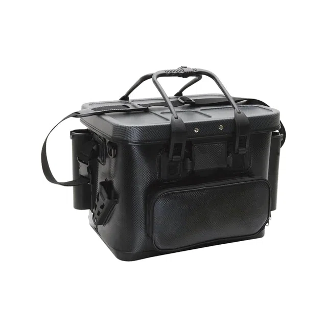 A hard-sided black tackle box, shut, with its strap over the side.